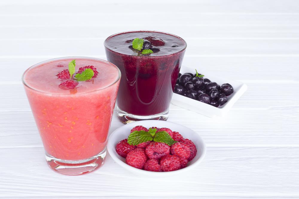 Two glasses of natural berry juice