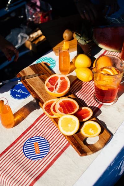 sliced-citrus-fruits-on-cutting-board