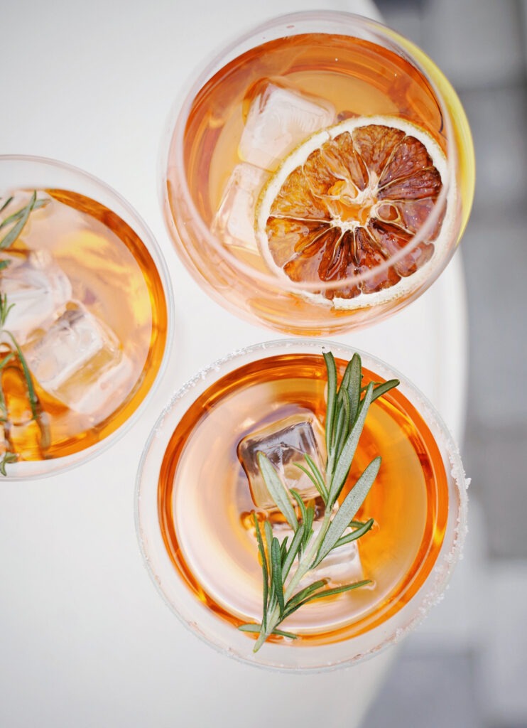 sliced orange fruit in a clear drinking glass
