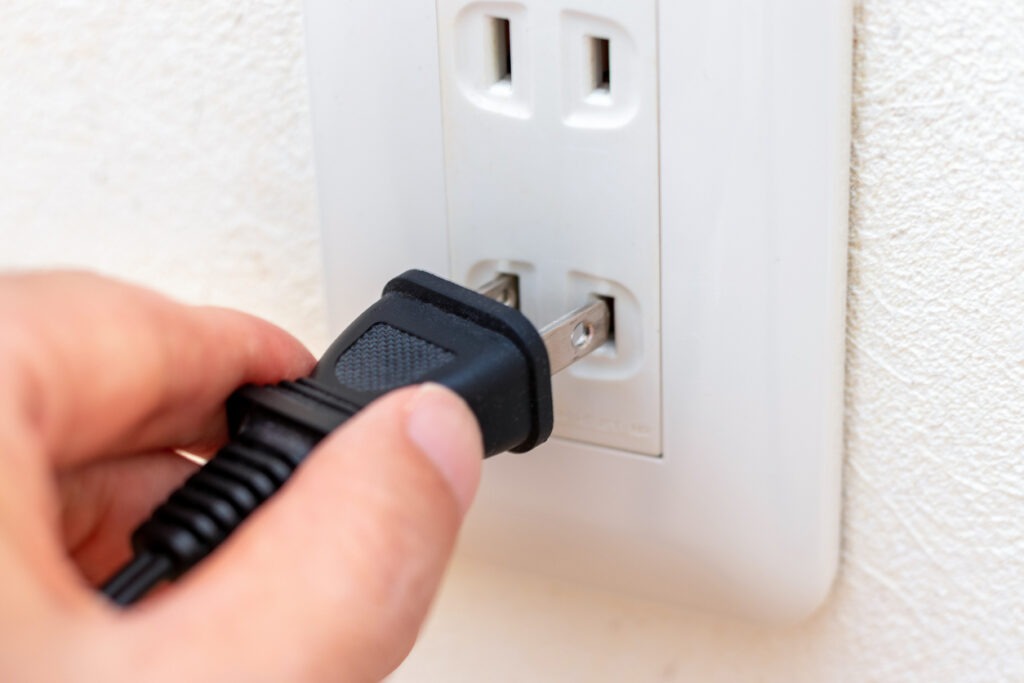 Insert the power plug into the wall outlet